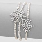 silver tone triple layered snowflake.JPG